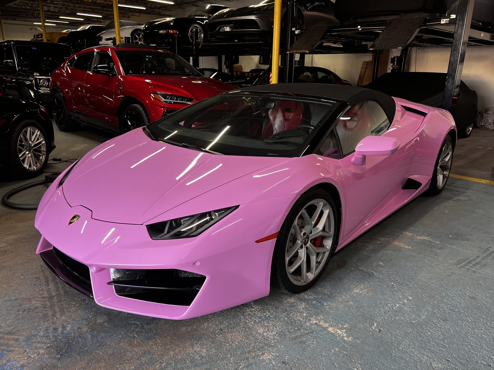 A pink Lamborghini Huracán Spyder in our garage, ready for prom night